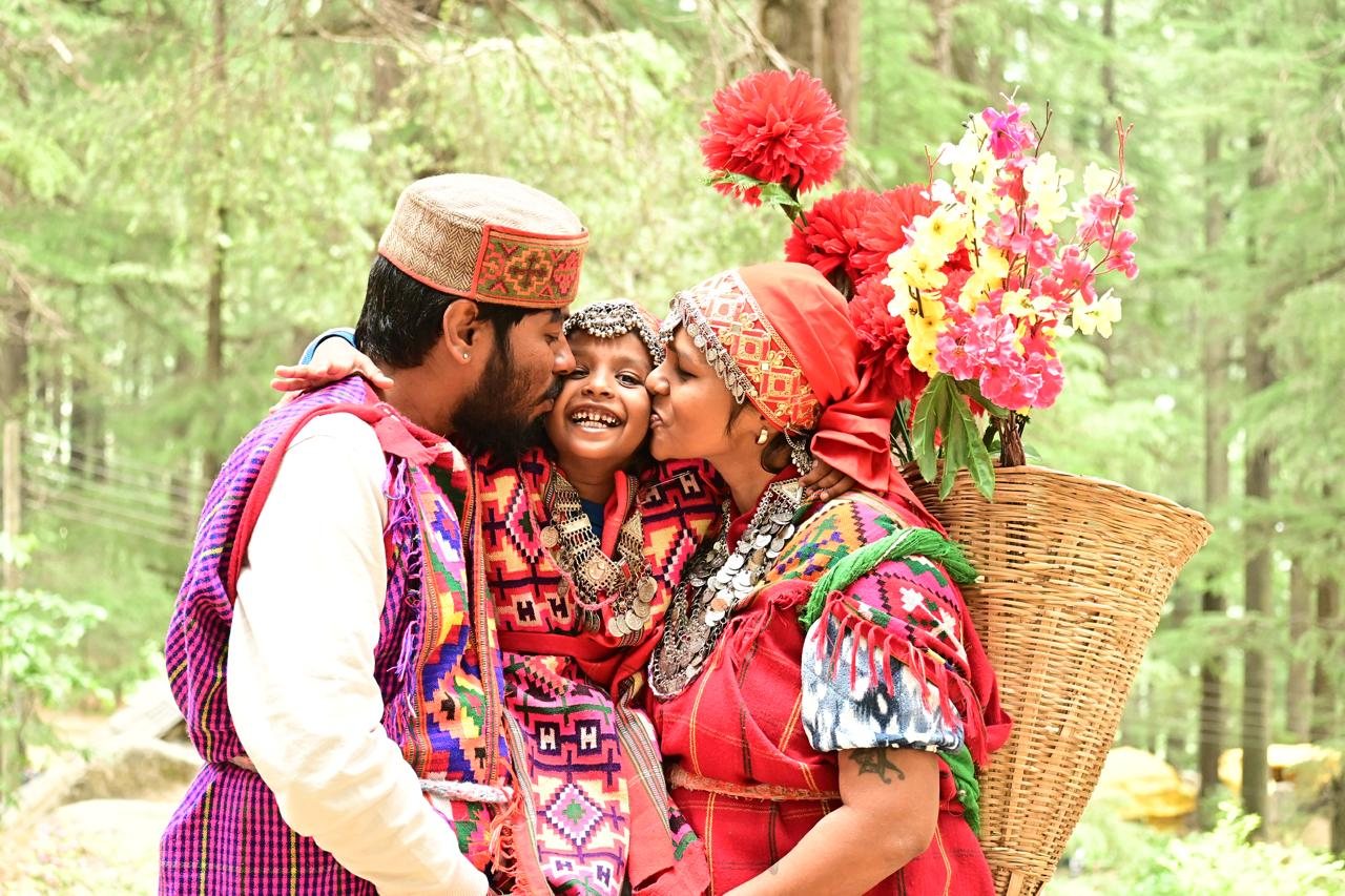 Couple in traditional Himachali dress in Manali forest